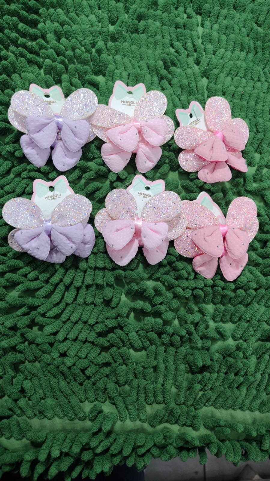 Par de colitas de pelo mariposa