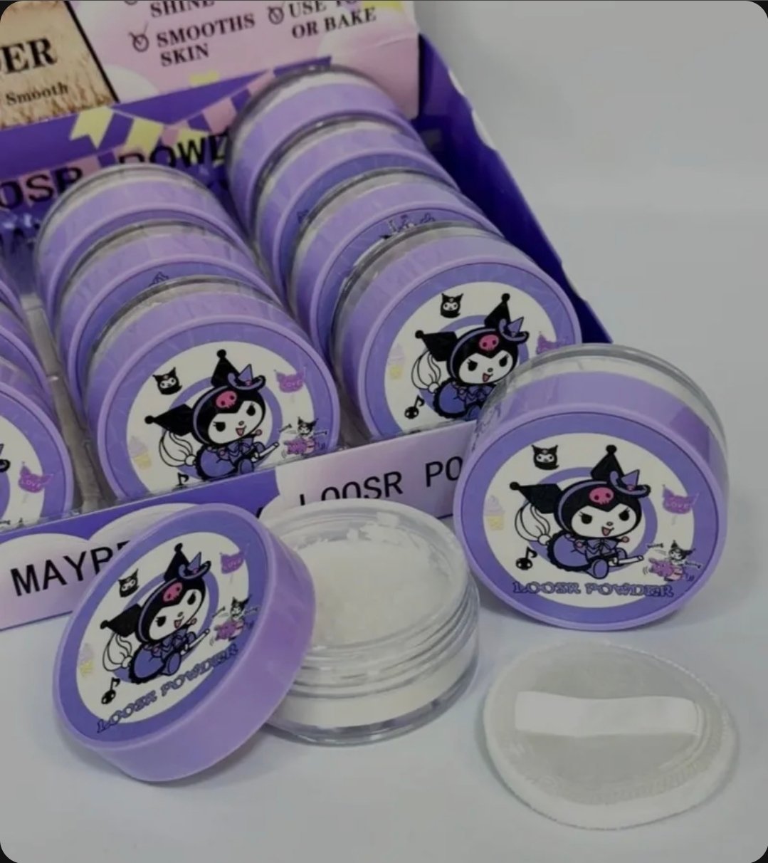Polvo traslúcido kuromi con esponjita